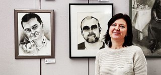 Выставка портретов в библиотеке